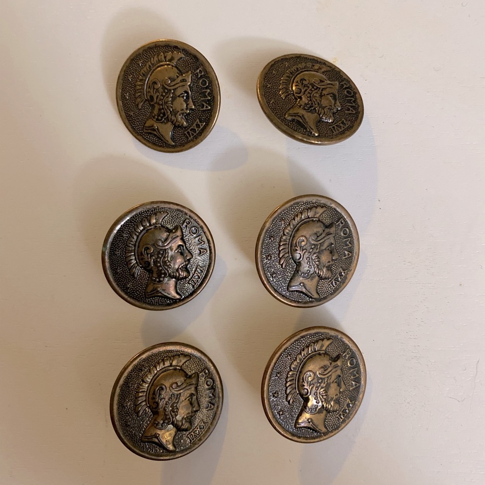 Set of 6 raised print vintage Roma XXVl buttons great condition.